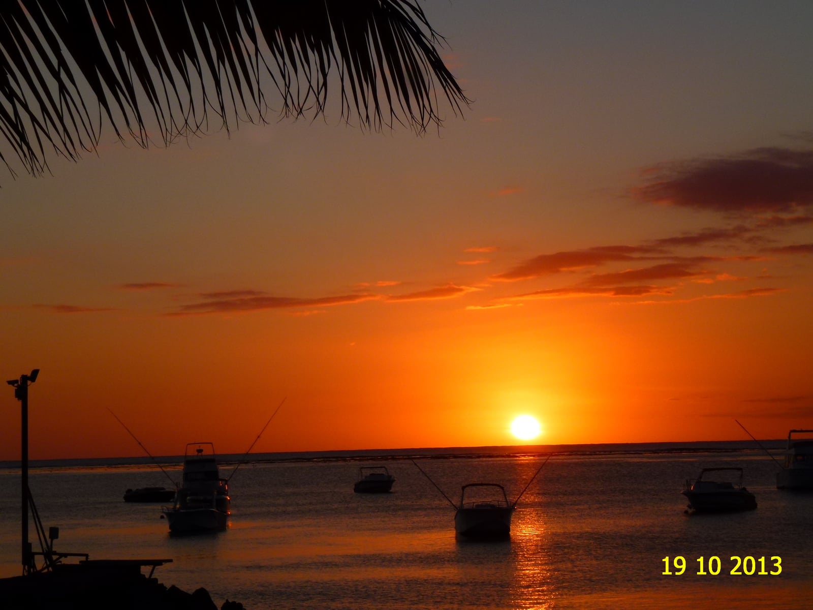 Sunset catamaran off Le Morne, then 500 candles on the sand